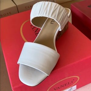 White sandals made by vaneli.  New in box
